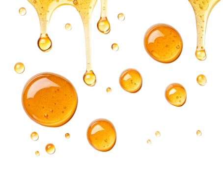 Golden honey drops dripping sweet organic natural healthy food dessert syrup honeyed liquid isolated shot