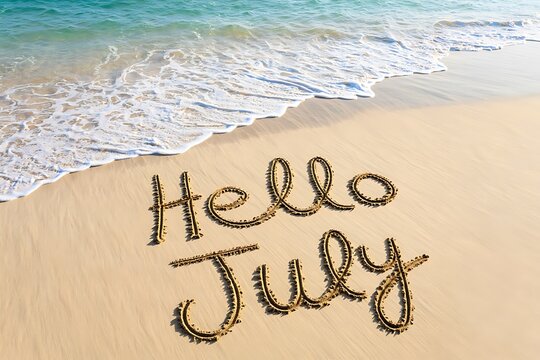 Hello july message written on beach sand with waves in background