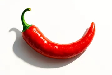 Single red chili pepper on a clean white surface, highlighting its bold color, spicy essence, and the sharp simplicity of natural heat in minimalist food presentation