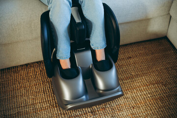 Modern foot massager and relaxation device in use for comfort and home wellness