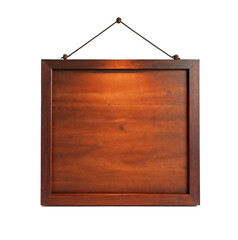Empty wooden frame hanging on white wall with spot lighting