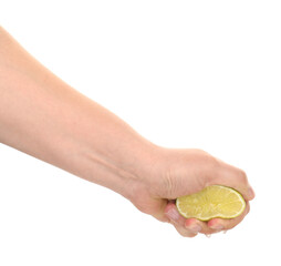Woman squeezing lime on white background, closeup