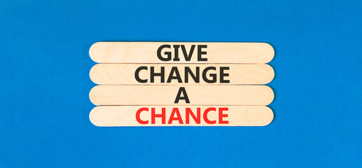 Give change a chance symbol. Concept words phrase Give change a chance on beautiful wooden stick....