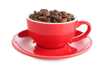 Ceramic cup with roasted coffee beans isolated on white
