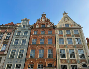Fototapeta premium Colored houses against the blue sky. Close-up. Gdansk. Poland
