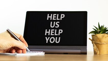 Help you symbol. Concept words phrase Help us help you on beautiful black tablet. Businessman's...