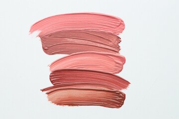 Colorful lip glosses on white background, flat lay