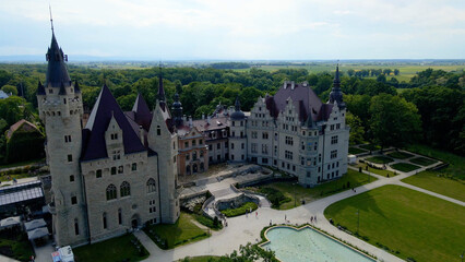 Moszna Castle fly over landscape view from above architecture near the village Moszna Poland