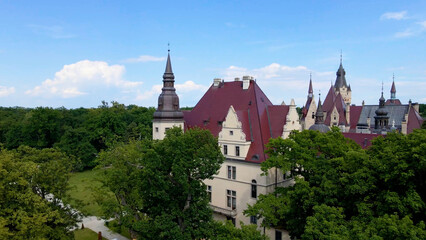 Moszna Castle fly over landscape view from above architecture near the village Moszna Poland