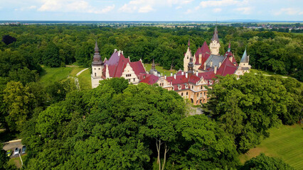 Moszna Castle fly over landscape view from above architecture near the village Moszna Poland