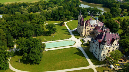 Moszna Castle fly over landscape view from above architecture near the village Moszna Poland