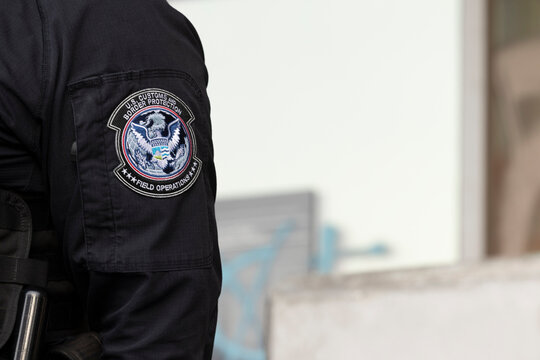 Los Angeles, California, USA - June 10, 2025: U.S. Customs and Border Protection (CBP) field officers guard a federal building during ICE deportation protests in Downtown LA. 