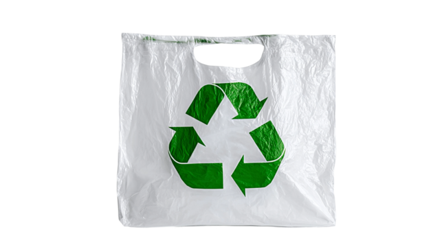 Eco-Friendly Shopping: A close-up of a reusable bag adorned with a vibrant green recycling symbol, a testament to the commitment to reduce, reuse and recycle.