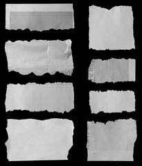 Torn papers on black