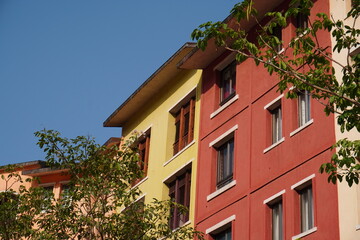 Vibrant Apartment Buildings Under Clear Sky