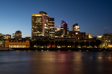 Skyscrapers on the Thames in London at night