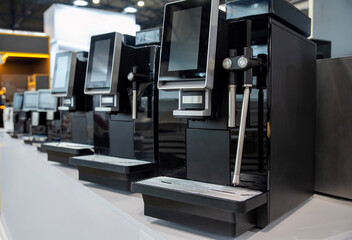 Modern automatic coffee machines in a row