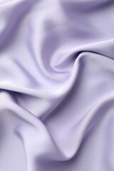 Crumpled violet silk fabric as background, top view