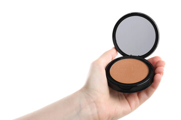 Woman holding open face powder with mirror on white background, closeup