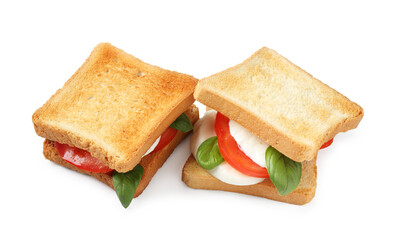 Tasty sandwiches with mozzarella cheese, tomatoes and basil on white background, above view