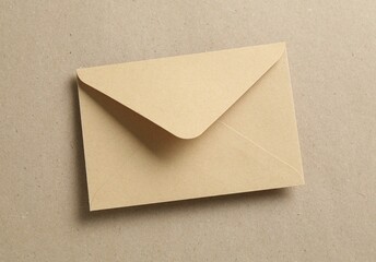 Beautiful invitation envelope on carton, top view
