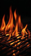 Flames Dance Above a Grill Grate During a Summer Barbecue in an Outdoor Setting