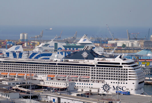 Genoa, Italy - June 2025: passenger ship MSC and ferry boats  GNV and Moby moored in the port. 