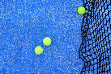 top down view of an empty paddle court showcasing lines and net