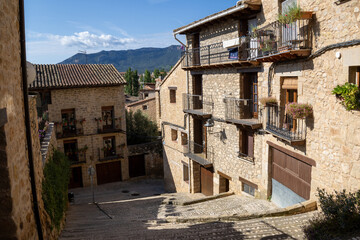 Valderrobres stone streets. A peaceful moment in a historic Spanish town, known for its medieval architecture, some of them with walls painted in blue and charming pathways. Teruel, Spain.