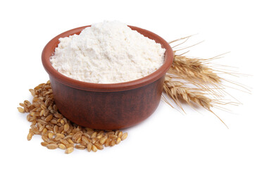 Wheat flour in bowl, grains and spikes on white background