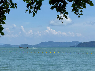Exotic scenery of amazing small islands capturing the beauty of Thailand, coastline where waves...