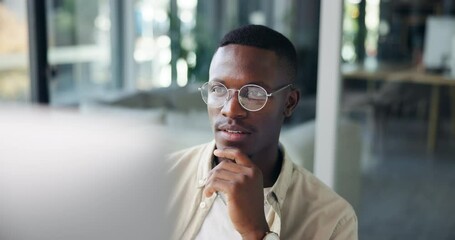 Black man, glasses and reading at computer for business, email networking or review article in office. Creative writer, SEO or thinking with tech for news information, latest trends or proofreading
