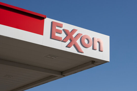 Houston, TX, USA - Apr 8, 2025: Exxon logo is seen at one of its gas stations in Houston, Texas. ExxonMobil Corporation is an American multinational oil and gas corporation based in Spring, Texas.