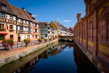 Naklejka premium Colorful canal side houses in alsace france charming town