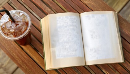 Obraz premium Iced coffee and a book