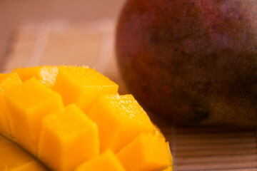 Fresh Juicy Mango with Sliced and Whole Fruit on Display