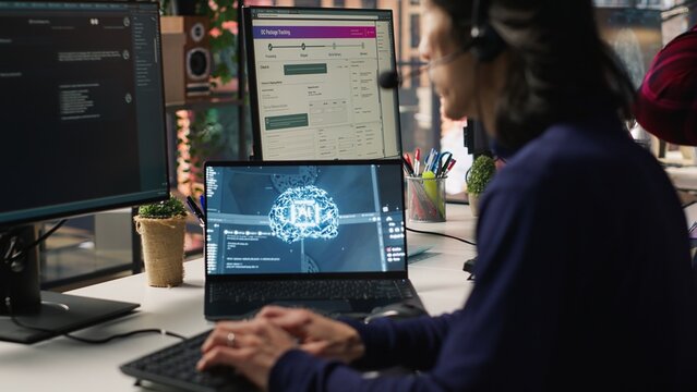 Call center agents track shipments in office using AI chatbot for help. Customer center workers use artificial intelligence assistance to locate clients packages and provide status updates, camera A - Powered by Adobe