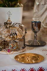 Orthodox Christian Ritual Still Life with Crown of Thorns, Chalice, and Icons, Gold and White Tones, Religious Ceremony Scene