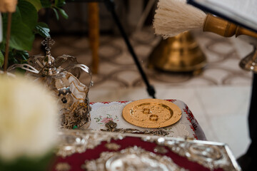 Orthodox Christian Communion Ritual Still Life: Silver Chalices, Paten, Red Cloth, Golden Objects, Candles, Religious Ceremony, Church Interior, Dark Tones