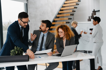 Business team working together on a big project