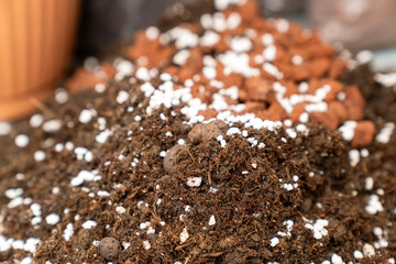 rich organic potting soil with perlite and clay pebbles, perfect for gardening, plant growth,...