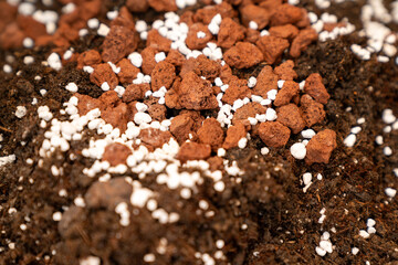 rich organic potting soil with perlite and clay pebbles, perfect for gardening, plant growth,...