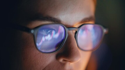 Diagrams woman glasses reflection closeup. Market trader face looking charts - Powered by Adobe
