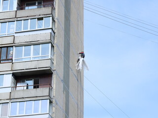 HighRise Window Cleaning with Essential Safety Gear for Enhanced Protection and Efficiency