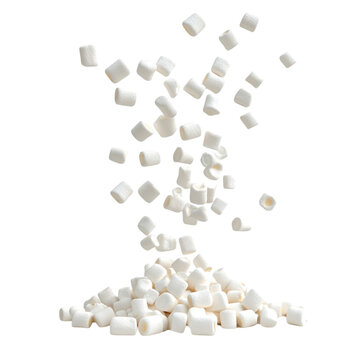 Marshmallows falling onto a pile against a colorful striped background