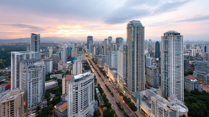 Obraz premium City skyline with tall buildings and sunset sky