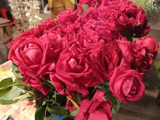 Beautiful red rose flowers in a flower shop. Red roses for ceremony.  