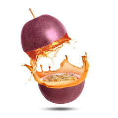 Tasty passion juice splashing out from cut fruit in air on white background