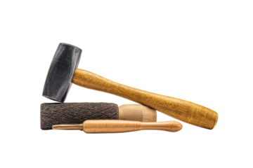 Flat-lay image of chisel, mallet and file symmetrically arranged, soft lighting, top-down view on timber background revealing traditional woodworking kit