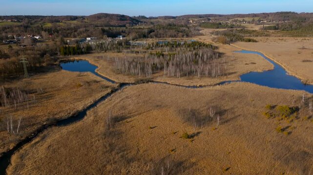 Aerial view of the upper course of the Wurm River from Starnberg to Leutstetten. The Leutstettener Moos nature reserve is located in the Leutstetten district of Starnberg, Upper Bavaria, Germany. 